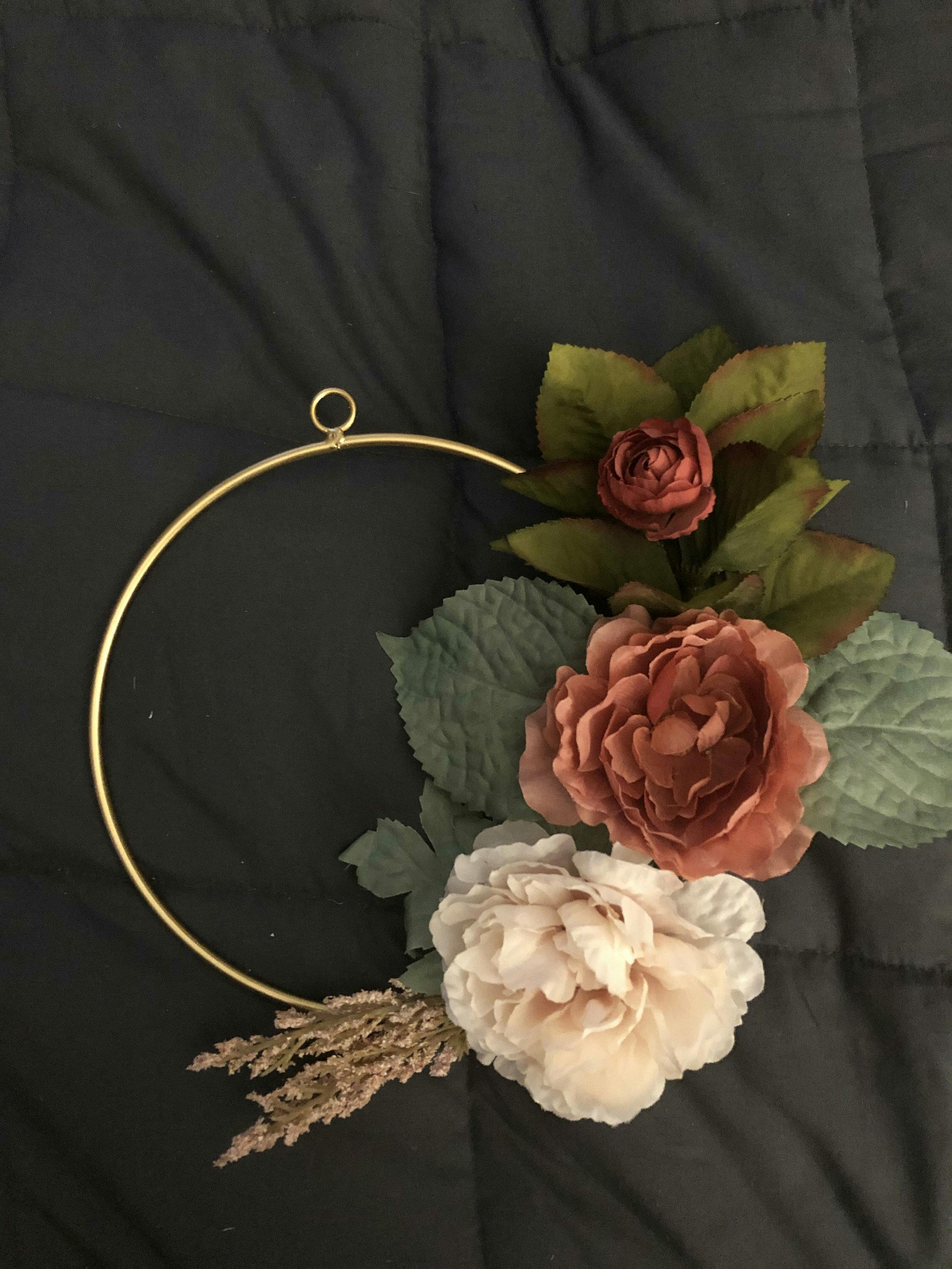 Gold Ring Floral Wreath with 3 flowers: 2 red (one small and one big), and 1 white